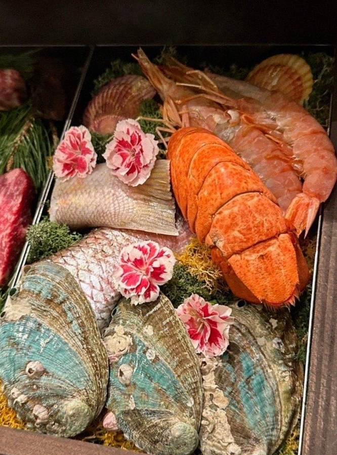 WOOHANA Yeouido · seafood course served alongside the beef