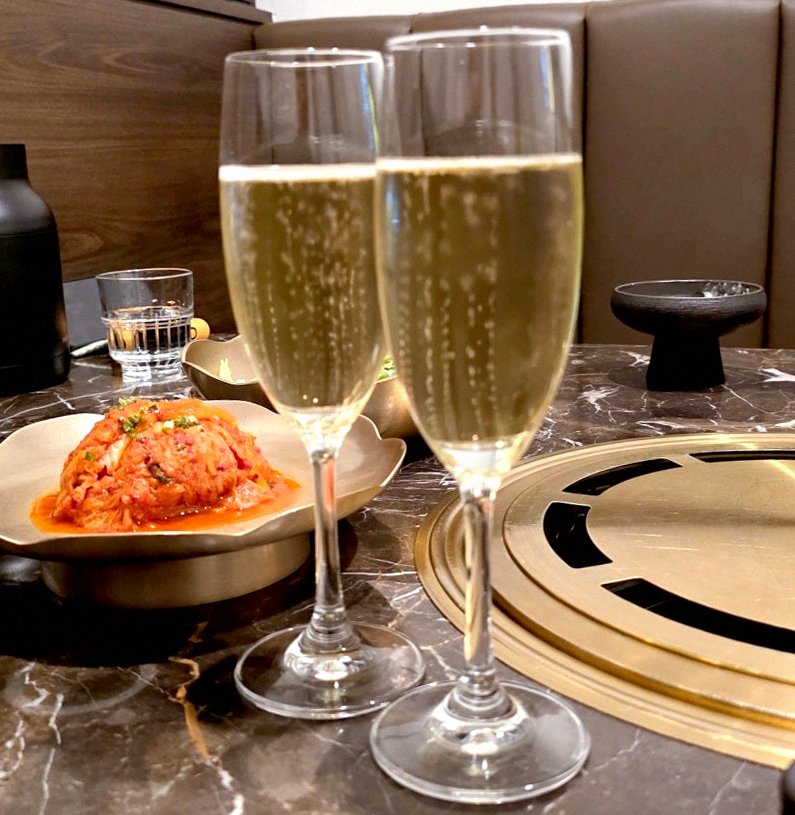 DAEBOJUNG City Hall · the signature Hanwoo showing — marbled beef cuts and caviar presented in a display chest