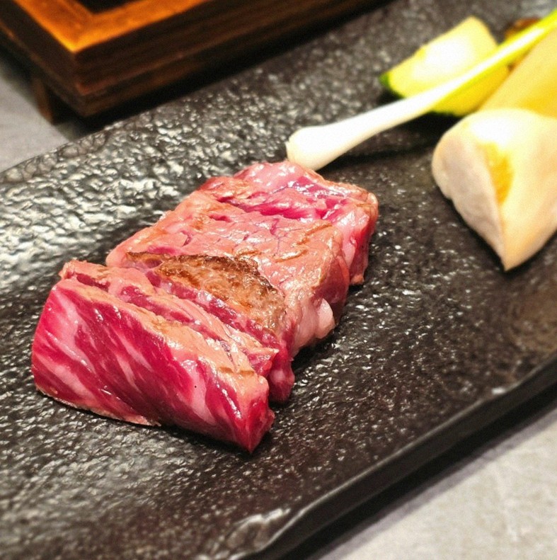 WOOHANA Jonggak · premium marbled Hanwoo beef presented before grilling