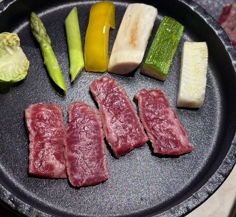 WOOARA Yeouido · premium marbled Hanwoo beef presented before grilling