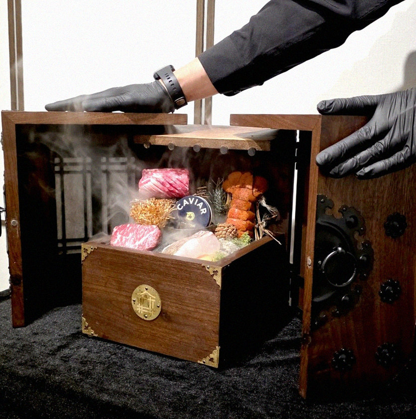 DAEBOJUNG Yeouido · the signature Hanwoo showing — marbled beef cuts and caviar presented in a display chest