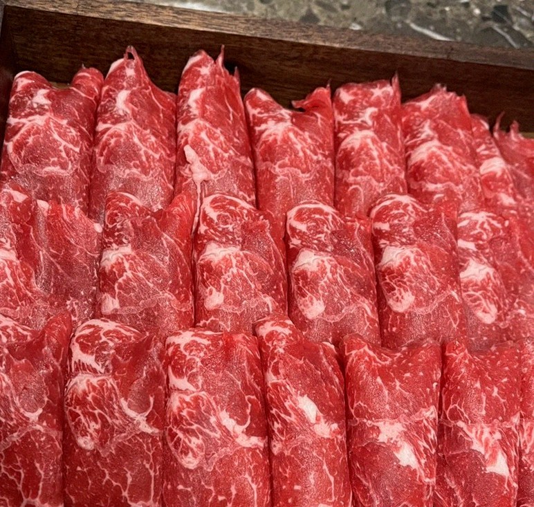 DAEBOJUNG City Hall · premium marbled Hanwoo beef presented before grilling