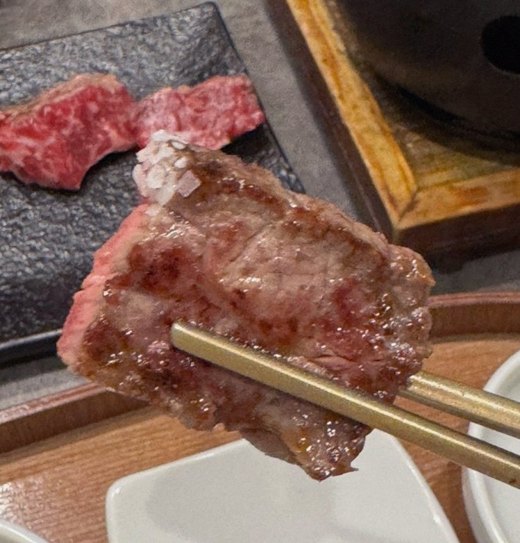 GOWOOGA Gwanghwamun · premium marbled Hanwoo beef presented before grilling