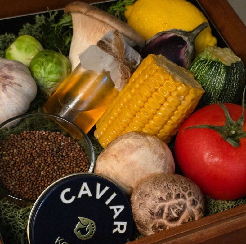 WOOARA Yeouido · the signature Hanwoo showing — marbled beef cuts and caviar presented in a display chest