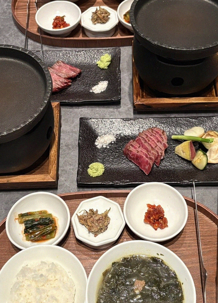 WOOHANA Jonggak · the signature Hanwoo showing — marbled beef cuts and caviar presented in a display chest