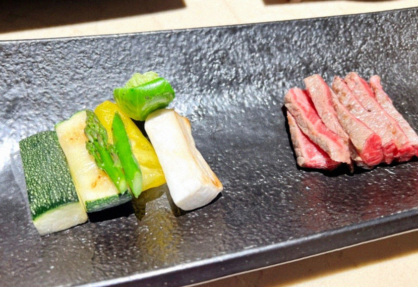 WOOARA Gwanghwamun · the signature Hanwoo showing — marbled beef cuts and caviar presented in a display chest