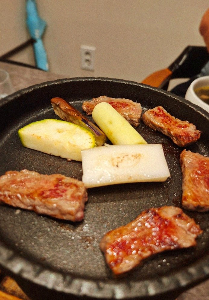 GOWOOGA Gwanghwamun · Hanwoo beef grilling over binchotan charcoal