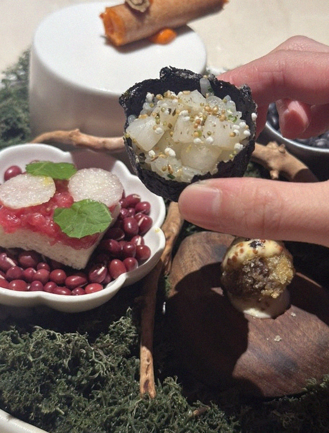 WOOARA Yeouido · the signature Hanwoo showing — marbled beef cuts and caviar presented in a display chest