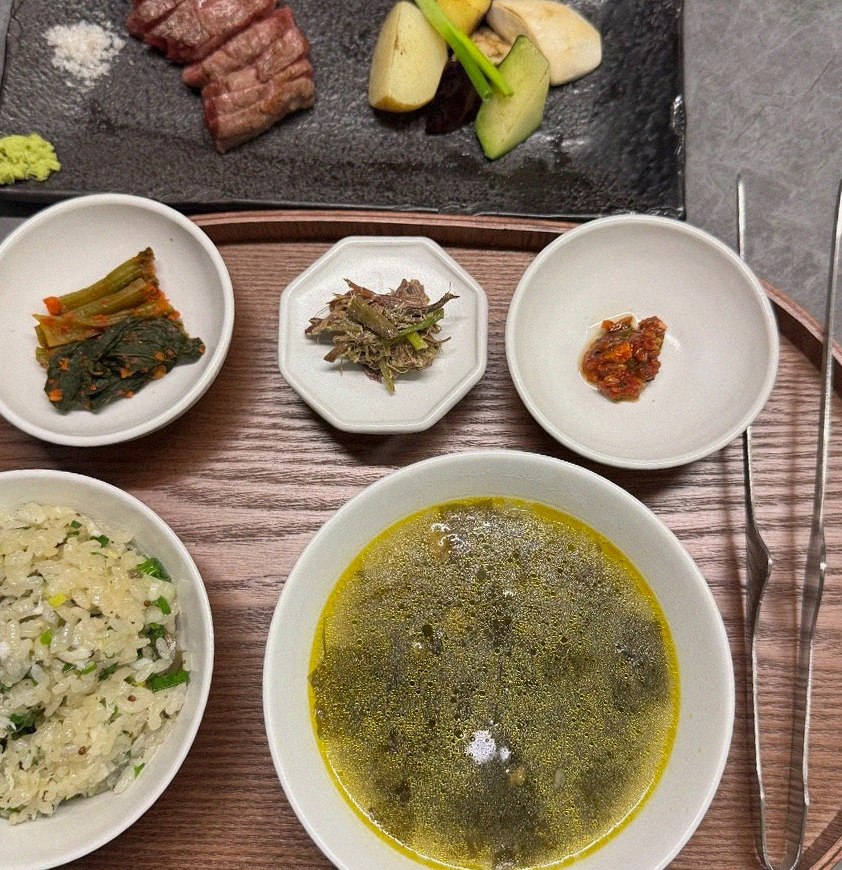 WOOHANA Jonggak · assorted Korean side dishes (banchan)