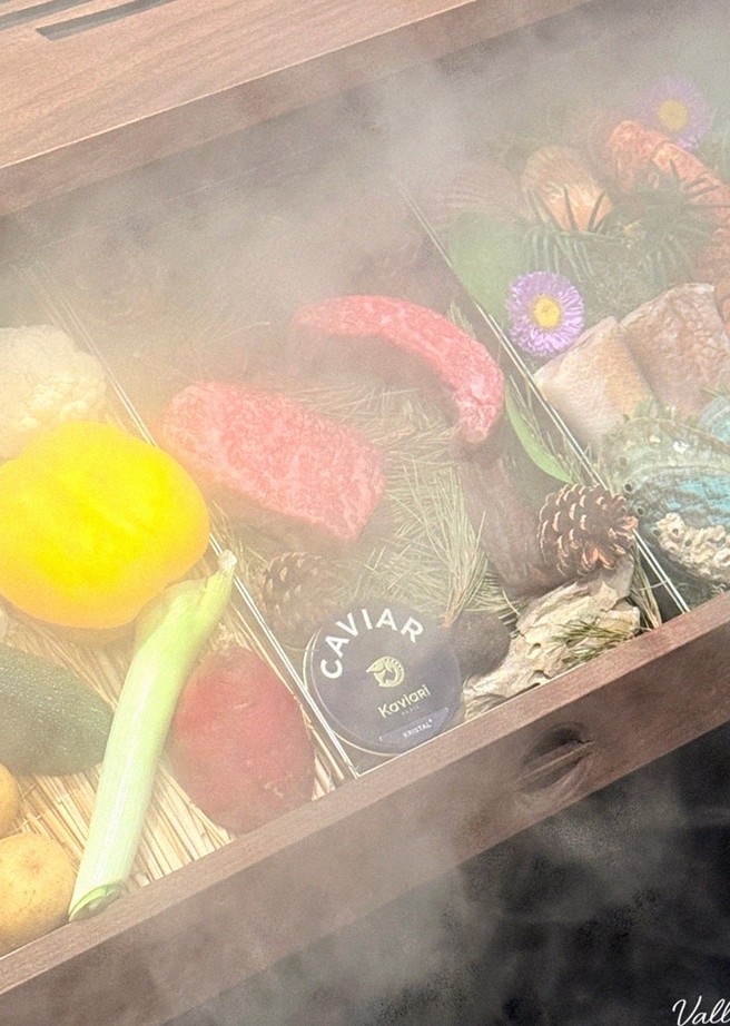 WOOHANA Yeouido · the signature Hanwoo showing — marbled beef cuts and caviar presented in a display chest
