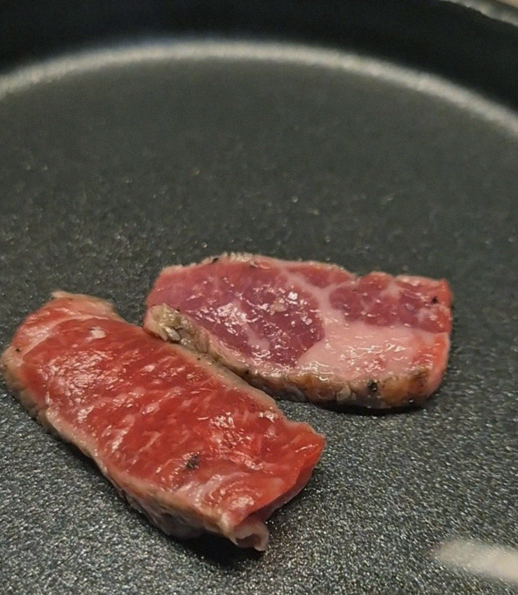 WOOARA Yeouido · premium marbled Hanwoo beef presented before grilling