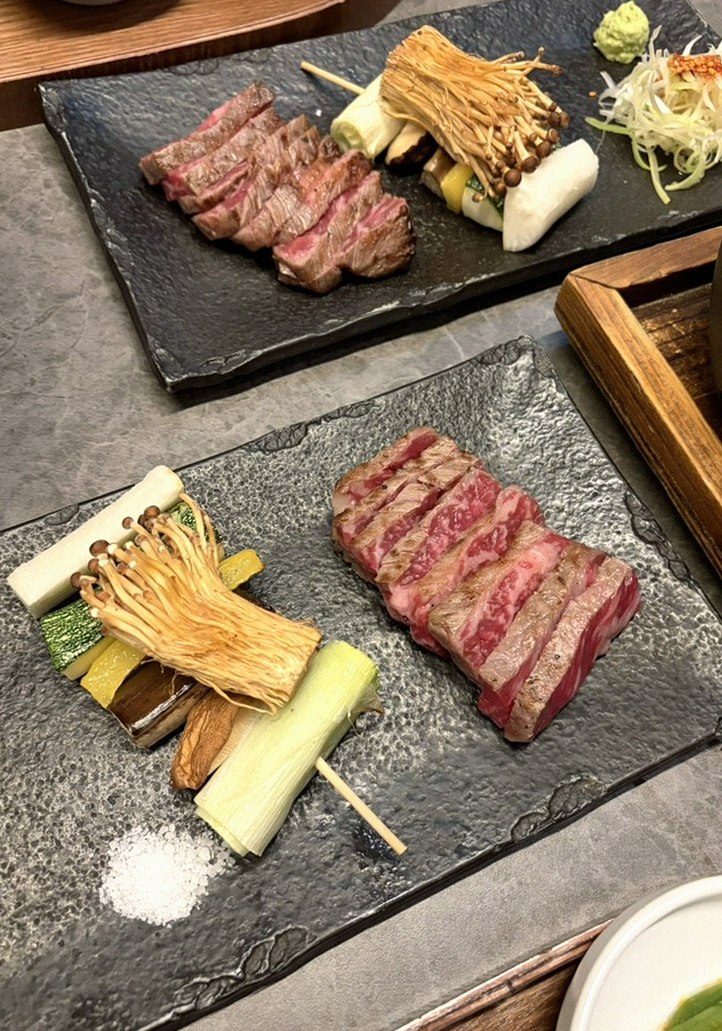 GOWOOGA Yeouido · premium marbled Hanwoo beef presented before grilling