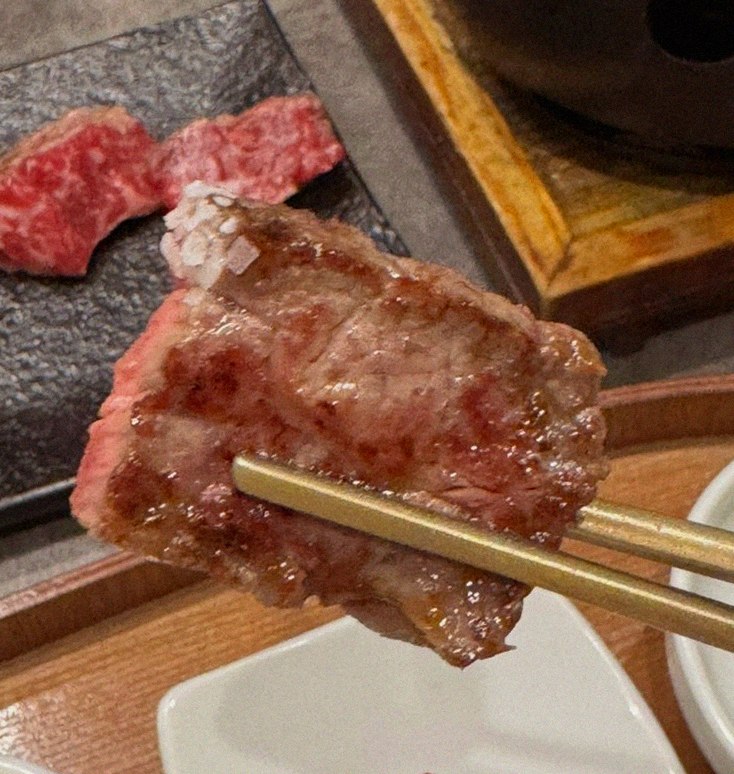 GOWOOGA Gwanghwamun · premium marbled Hanwoo beef presented before grilling