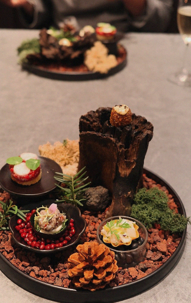 WOOHANA Yeouido · the signature Hanwoo showing — marbled beef cuts and caviar presented in a display chest