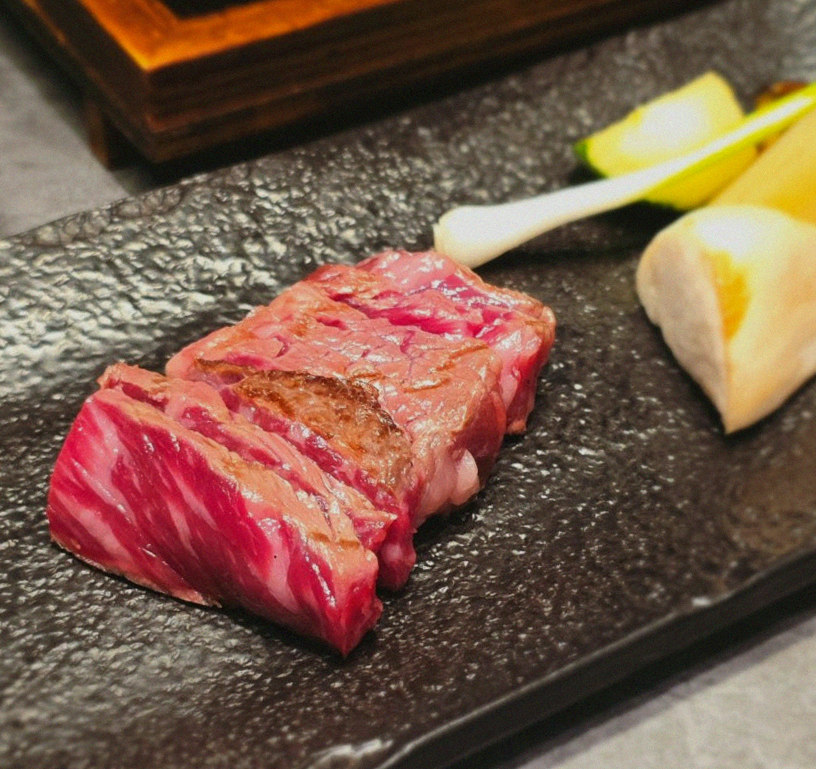WOOHANA Yeouido · premium marbled Hanwoo beef presented before grilling