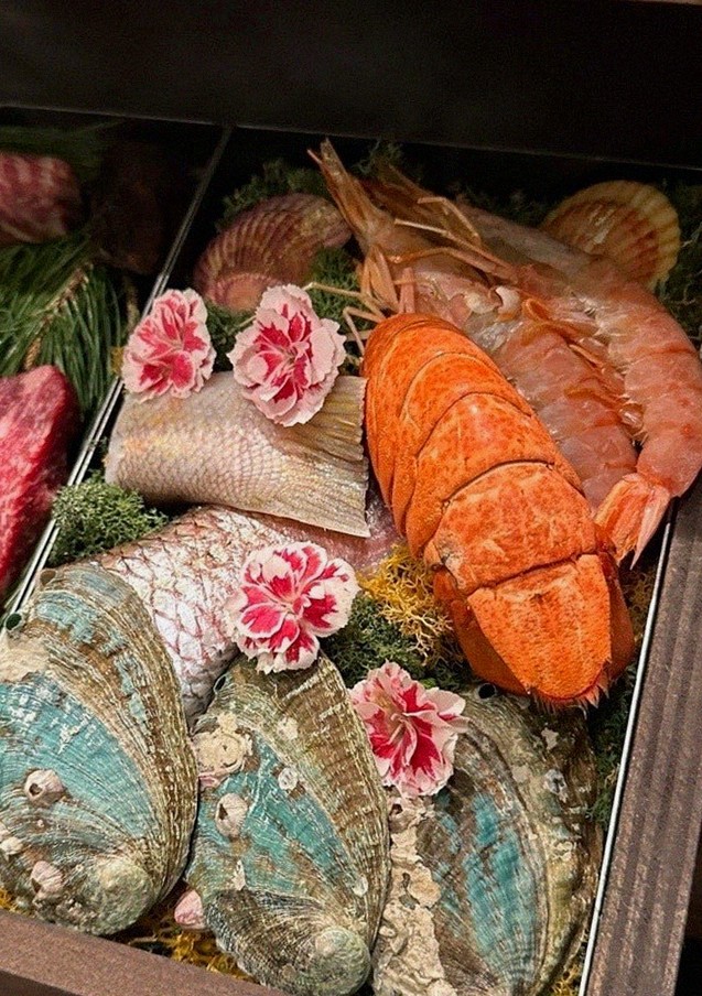 WOOHANA Yeouido · seafood course served alongside the beef