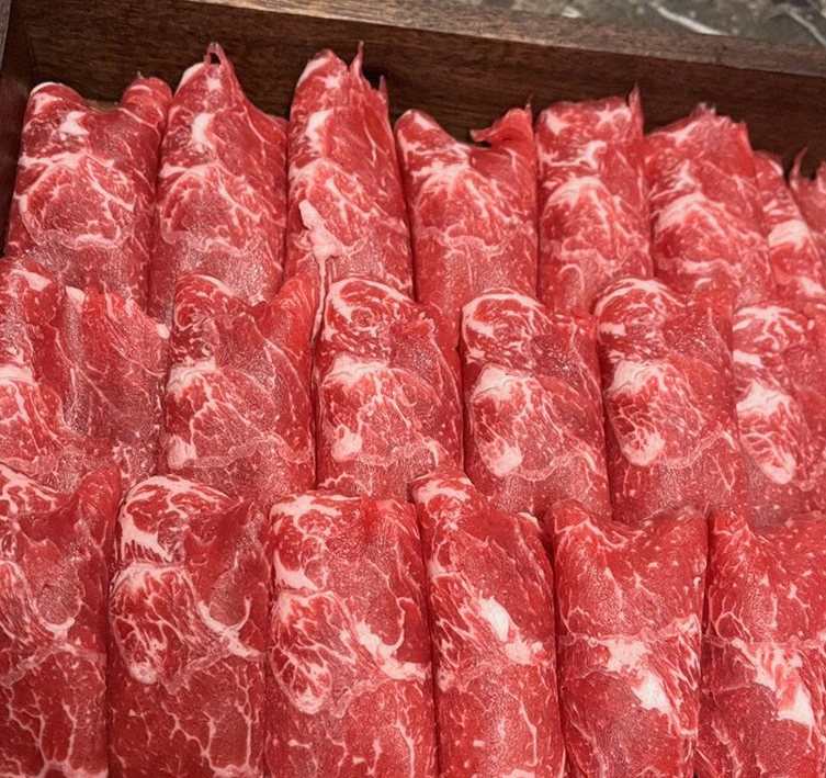DAEBOJUNG City Hall · premium marbled Hanwoo beef presented before grilling