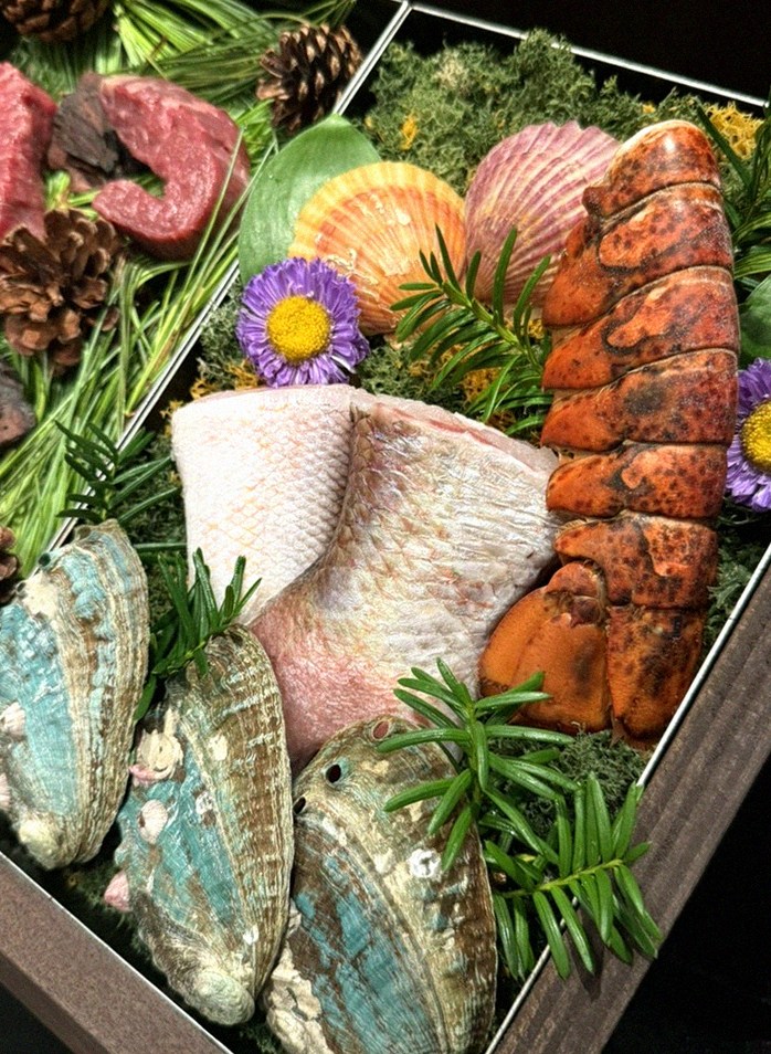 WOOHANA Yeouido · the signature Hanwoo showing — marbled beef cuts and caviar presented in a display chest
