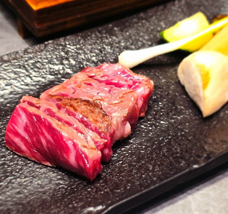 WOOHANA Yeouido · premium marbled Hanwoo beef presented before grilling