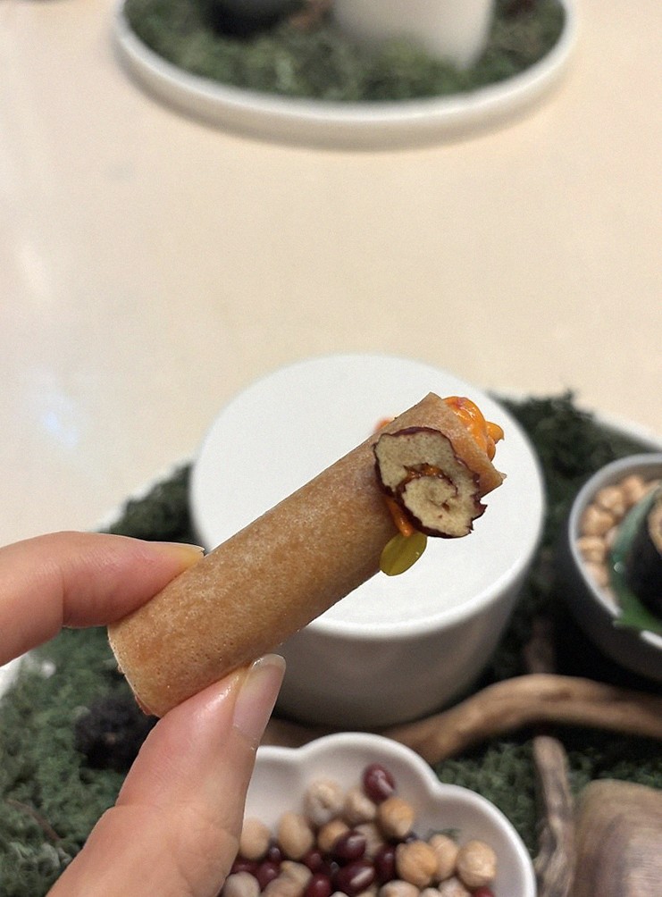 WOOARA Yeouido · the signature Hanwoo showing — marbled beef cuts and caviar presented in a display chest