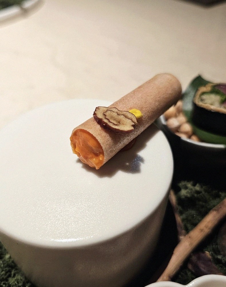 WOOARA Yeouido · the signature Hanwoo showing — marbled beef cuts and caviar presented in a display chest