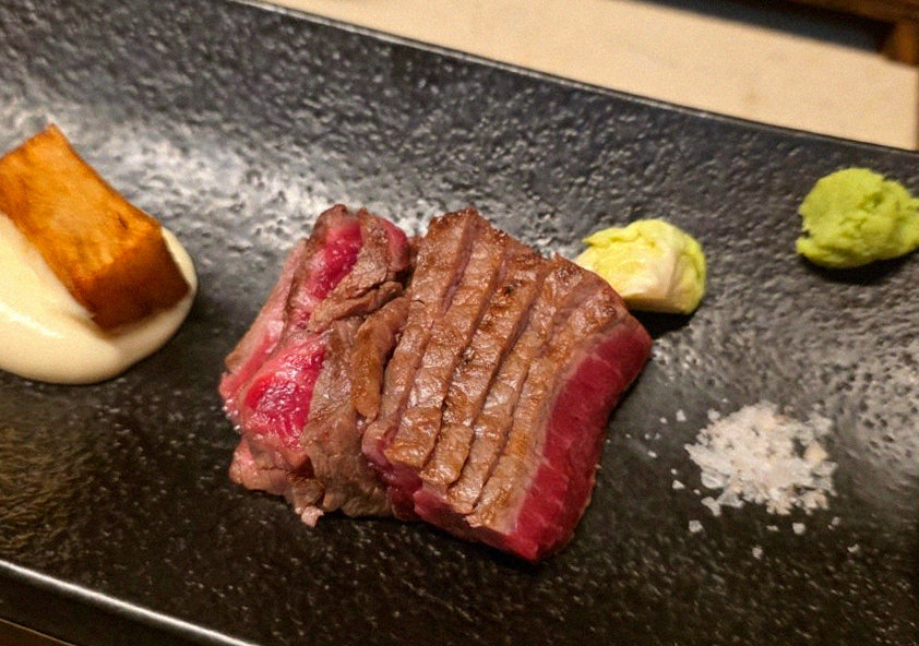 WOOARA Gwanghwamun · the signature Hanwoo showing — marbled beef cuts and caviar presented in a display chest