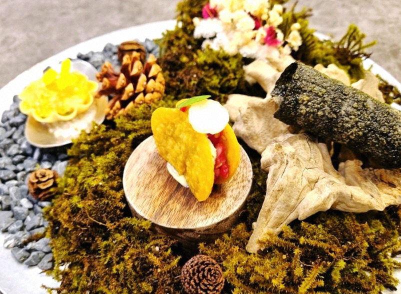 GOWOOGA Yeouido · the signature Hanwoo showing — marbled beef cuts and caviar presented in a display chest