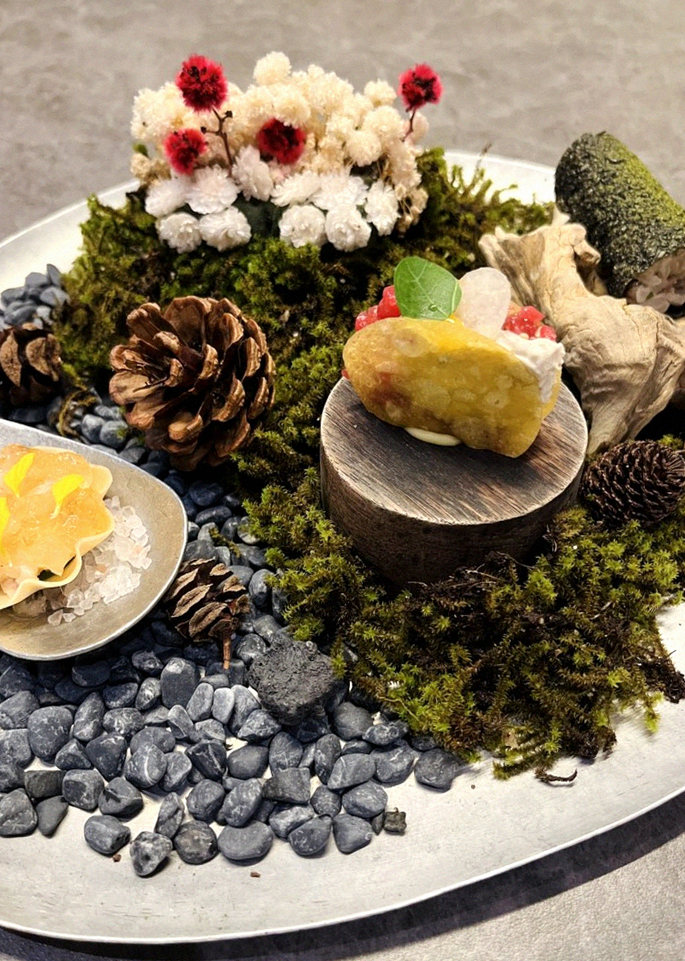 GOWOOGA Yeouido · the signature Hanwoo showing — marbled beef cuts and caviar presented in a display chest
