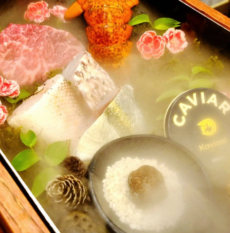 GOWOOGA Yeouido · the signature Hanwoo showing — marbled beef cuts and caviar presented in a display chest