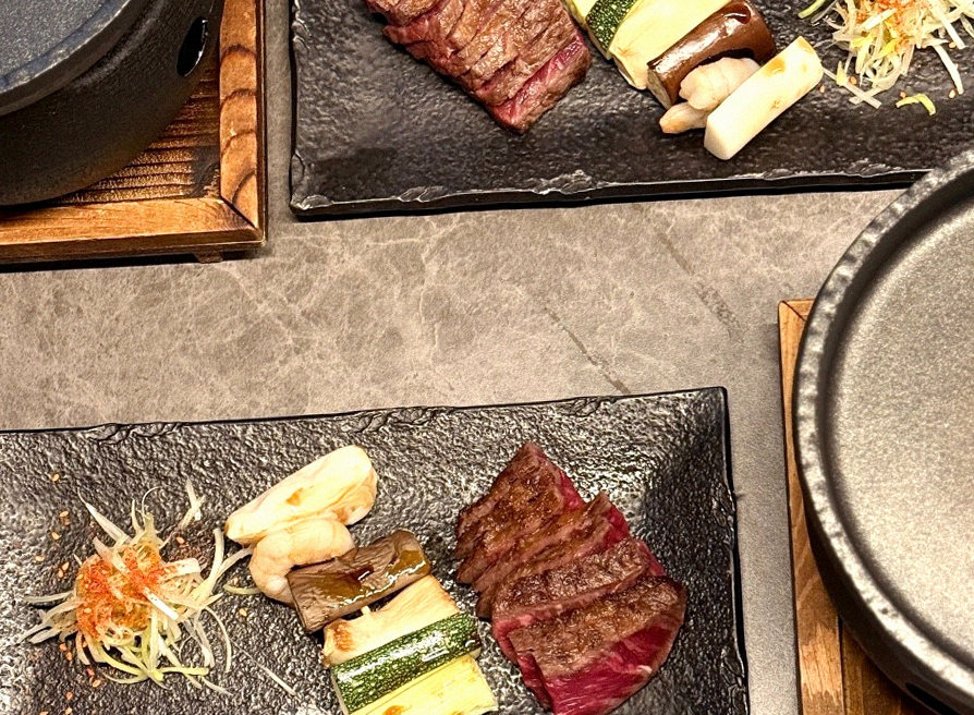 GOWOOGA Yeouido · the signature Hanwoo showing — marbled beef cuts and caviar presented in a display chest