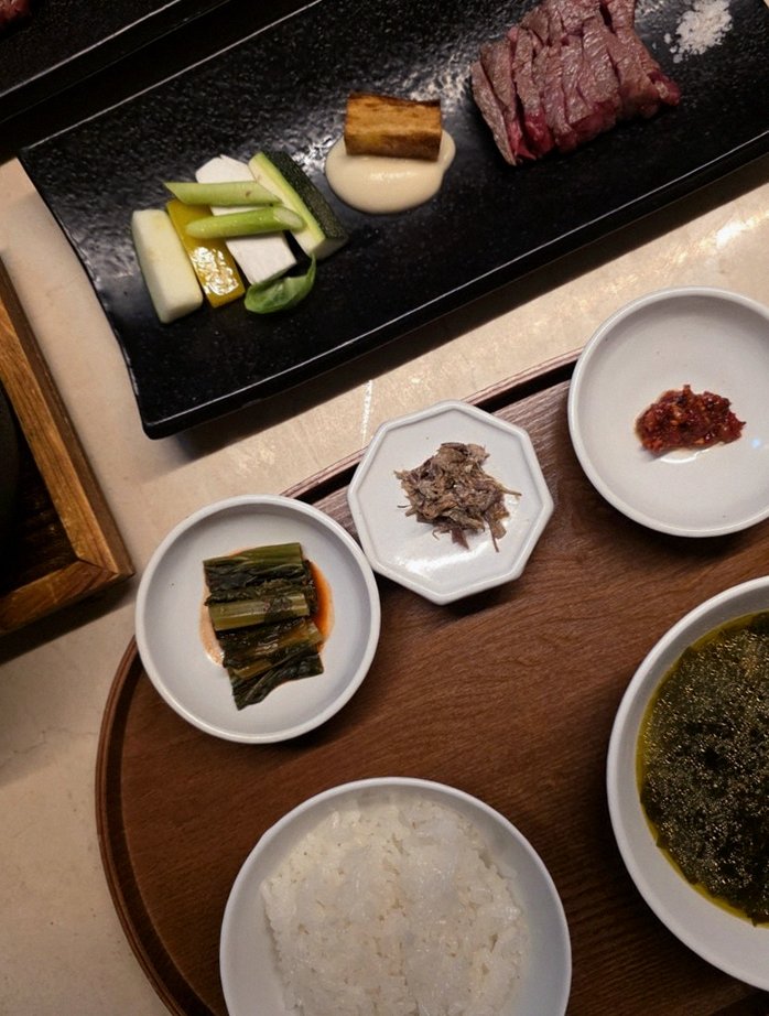 WOOARA Gwanghwamun · assorted Korean side dishes (banchan)