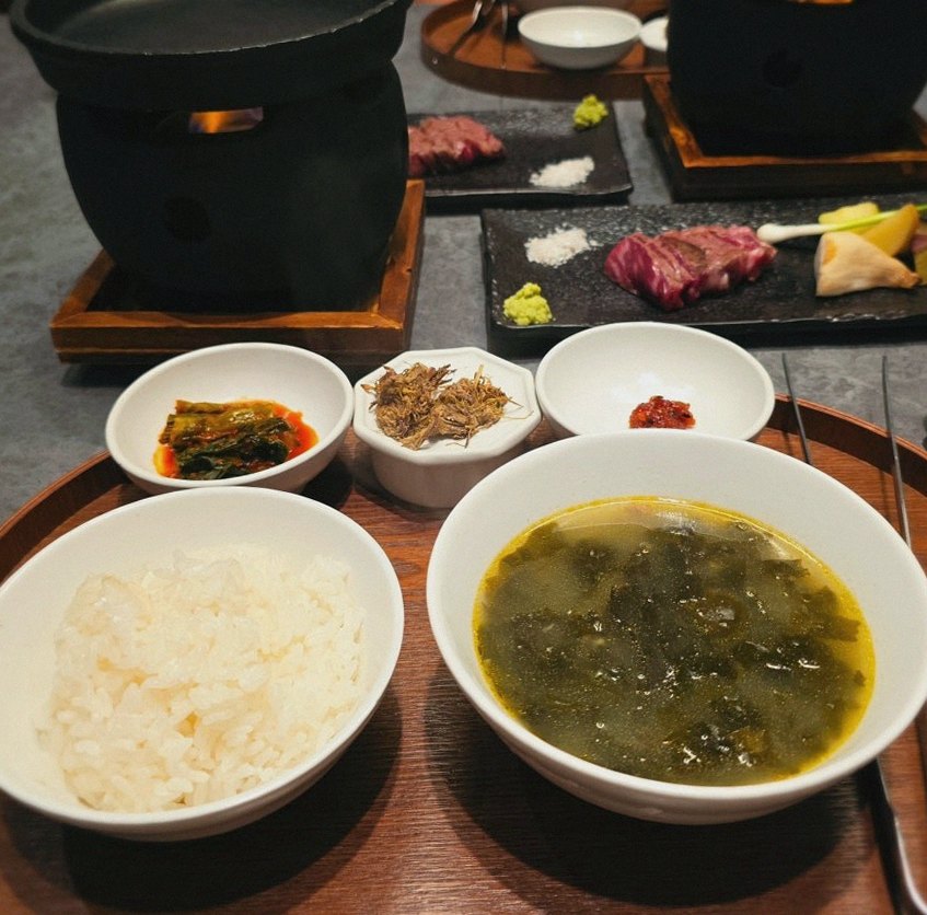 WOOHANA Jonggak · assorted Korean side dishes (banchan)
