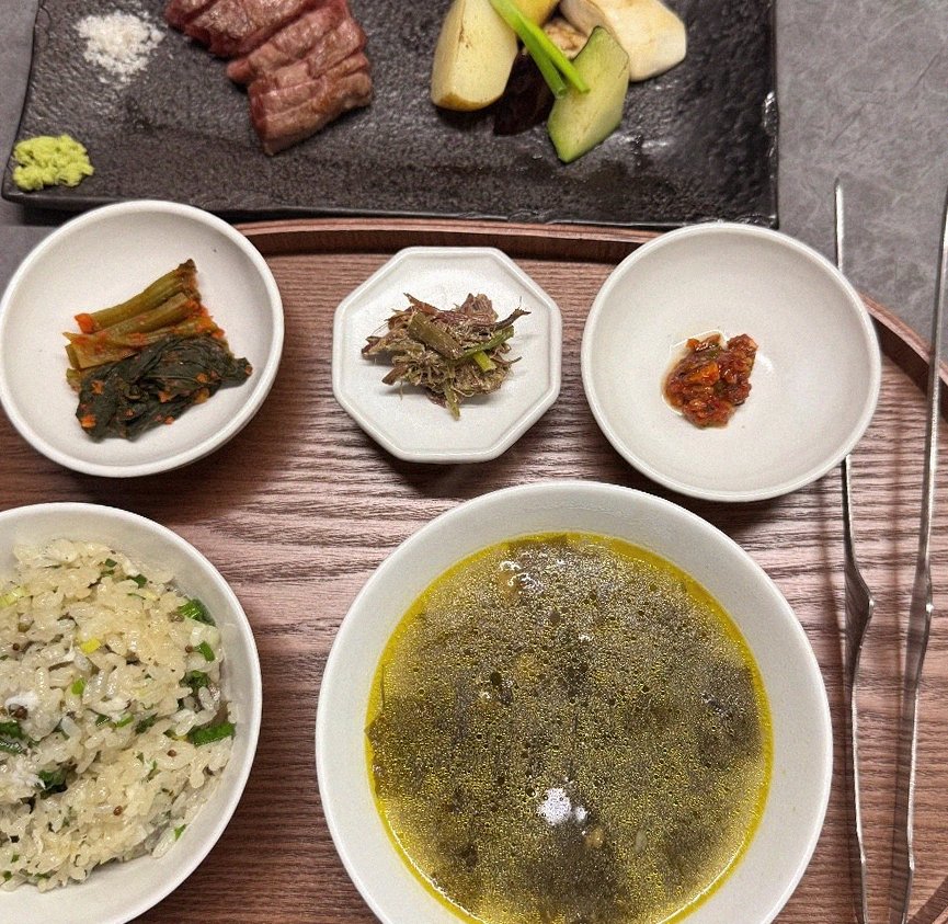 WOOHANA Jonggak · assorted Korean side dishes (banchan)