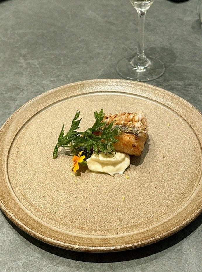 WOOHANA Jonggak · a plated course of Hanwoo beef