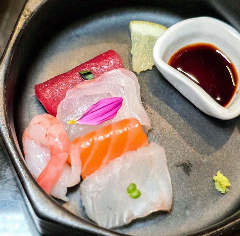 DAEBOJUNG Yeouido · seafood course served alongside the beef