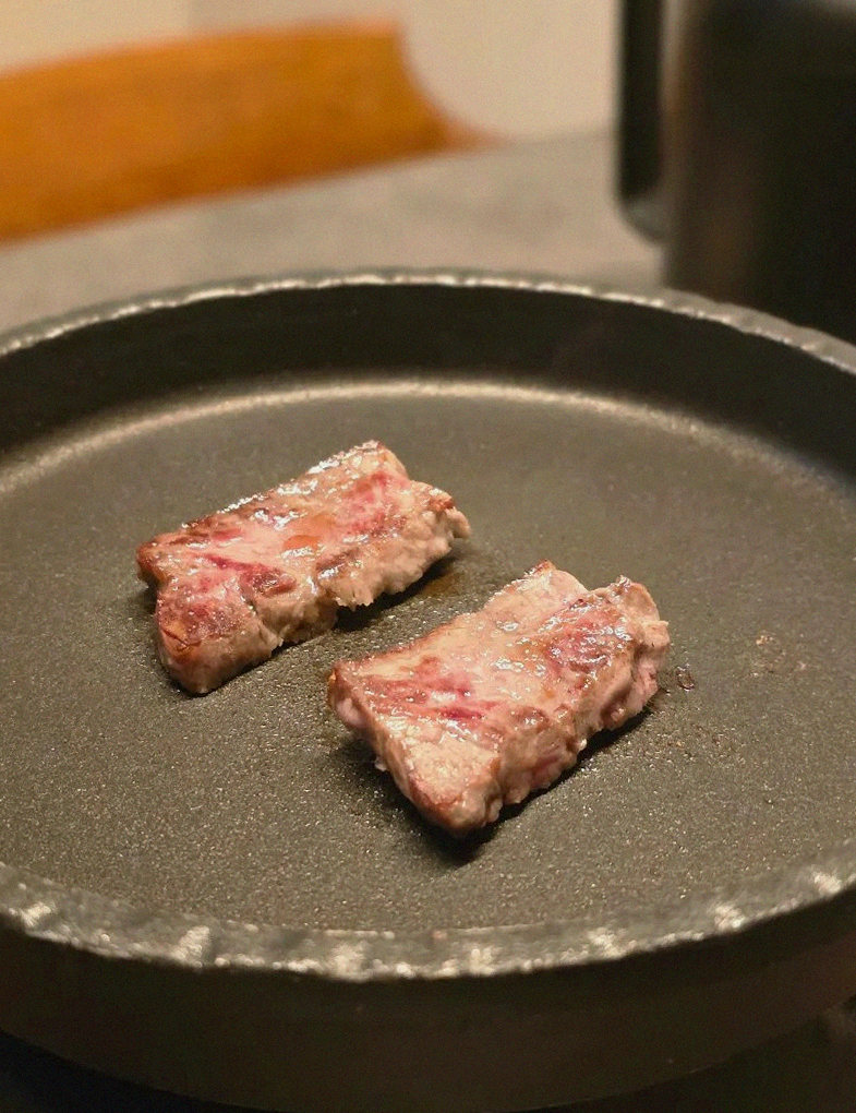 GOWOOGA Yeouido · premium marbled Hanwoo beef presented before grilling