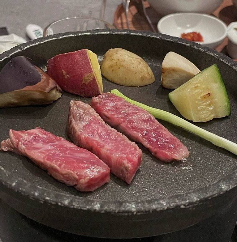 WOOHANA Yeouido · Hanwoo beef grilling over binchotan charcoal