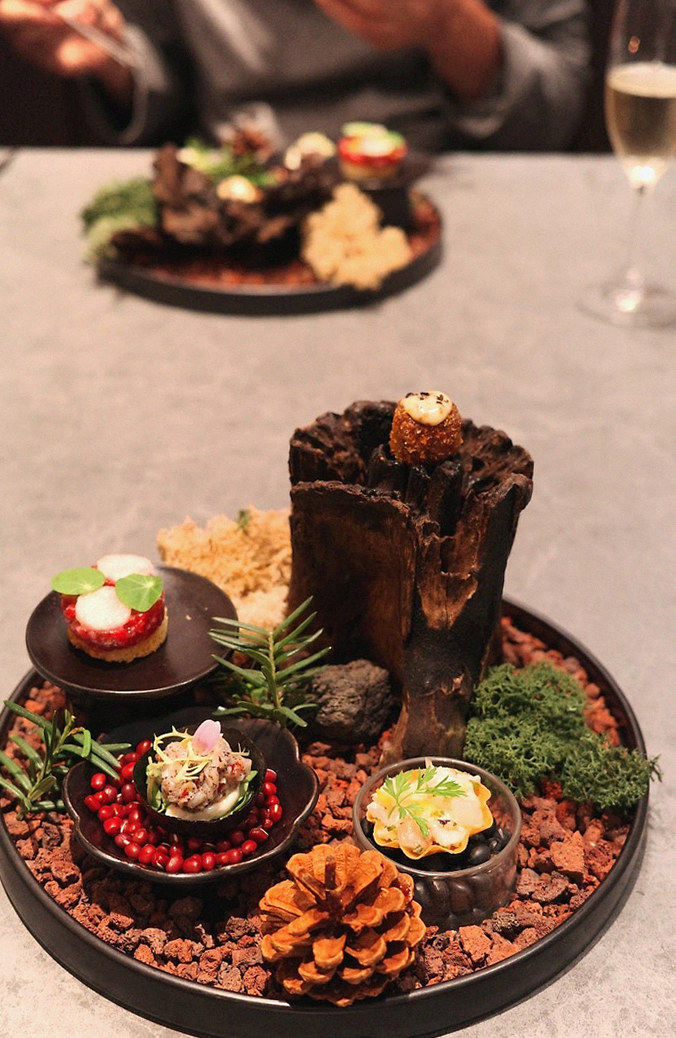 WOOHANA Jonggak · the signature Hanwoo showing — marbled beef cuts and caviar presented in a display chest
