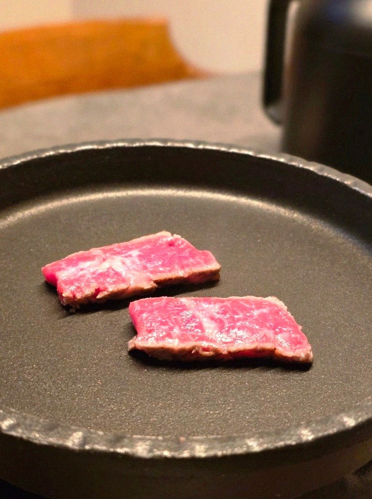 GOWOOGA Yeouido · premium marbled Hanwoo beef presented before grilling