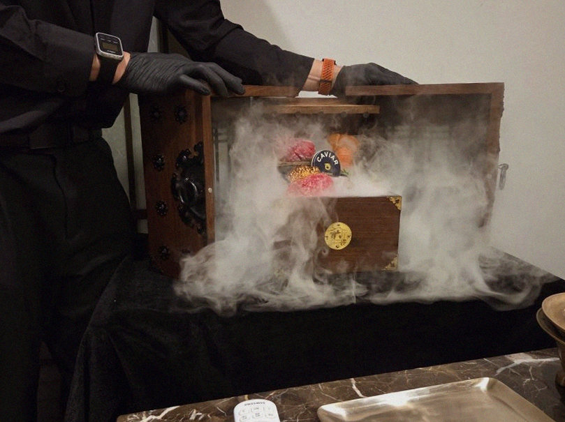 DAEBOJUNG City Hall · the signature Hanwoo showing — marbled beef cuts and caviar presented in a display chest