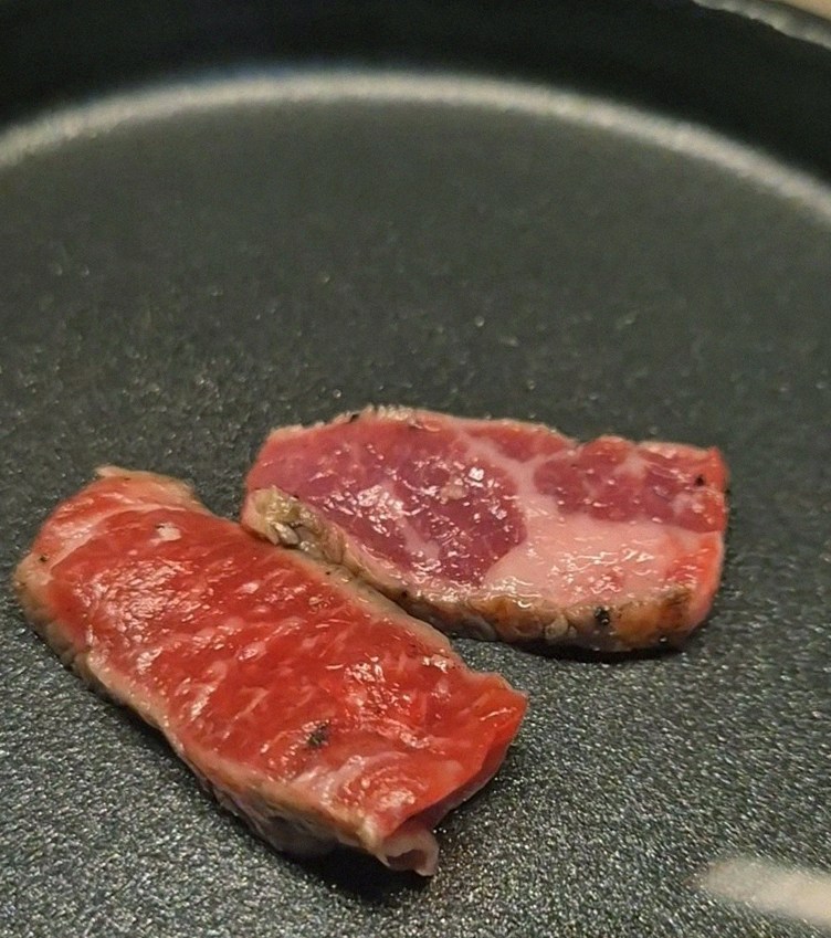 WOOARA Yeouido · premium marbled Hanwoo beef presented before grilling