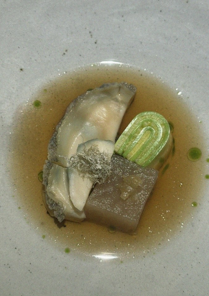 WOOARA Gwanghwamun · seafood course served alongside the beef
