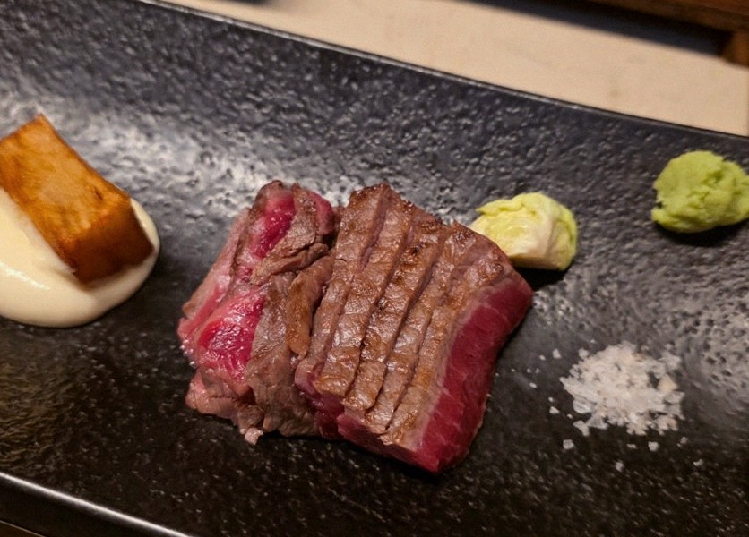 WOOARA Gwanghwamun · the signature Hanwoo showing — marbled beef cuts and caviar presented in a display chest