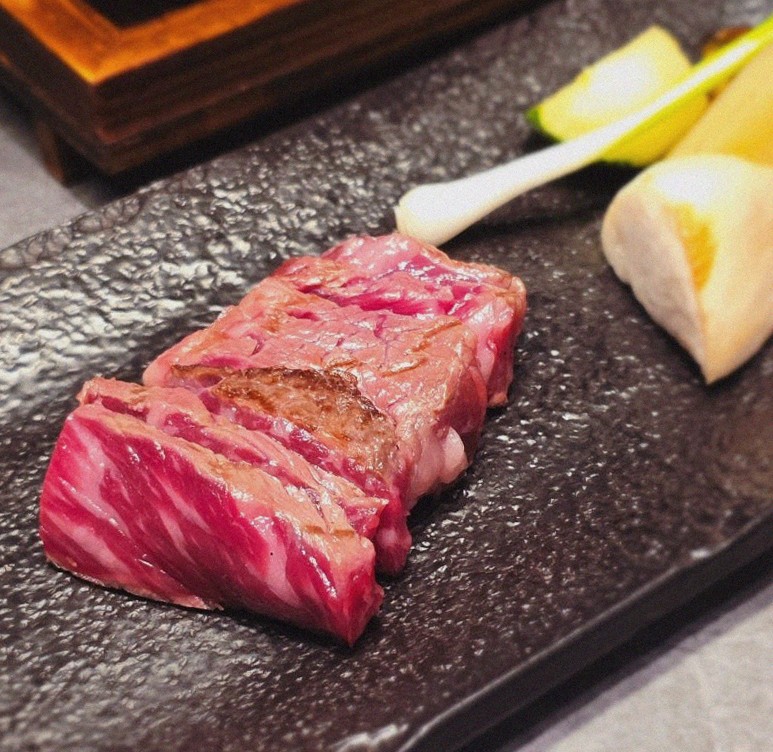 WOOHANA Yeouido · premium marbled Hanwoo beef presented before grilling