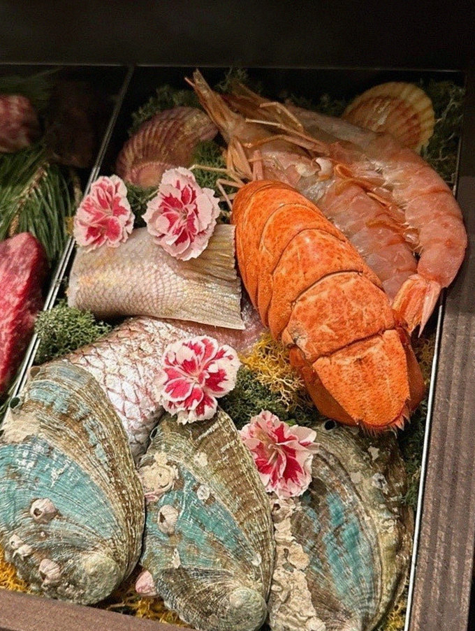 WOOHANA Yeouido · seafood course served alongside the beef