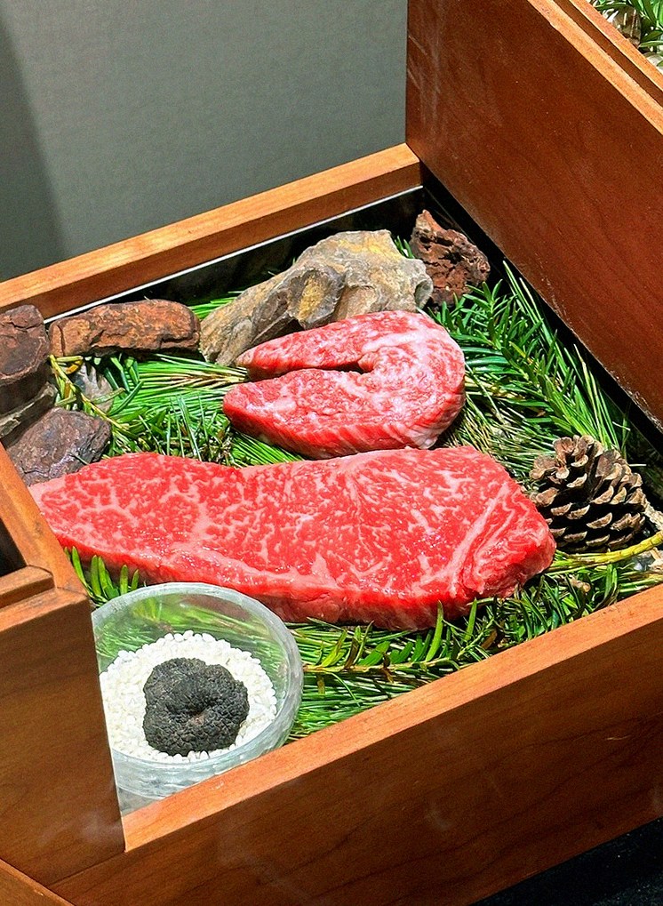 WOOARA Gwanghwamun · the signature Hanwoo showing — marbled beef cuts and caviar presented in a display chest