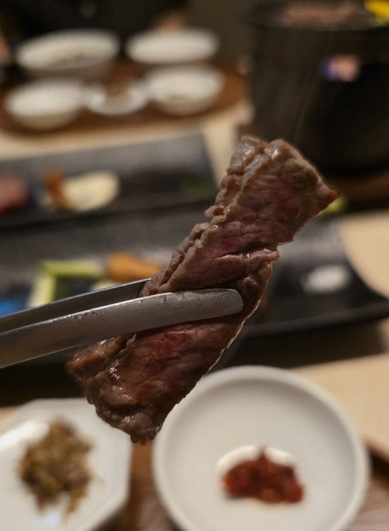 WOOARA Yeouido · premium marbled Hanwoo beef presented before grilling