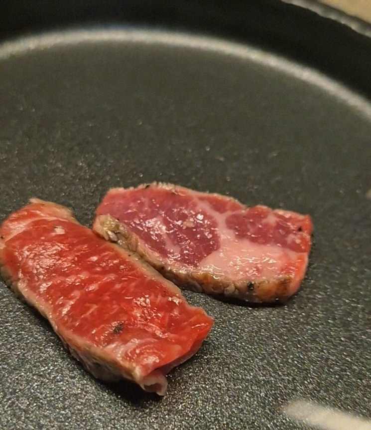 WOOARA Yeouido · premium marbled Hanwoo beef presented before grilling