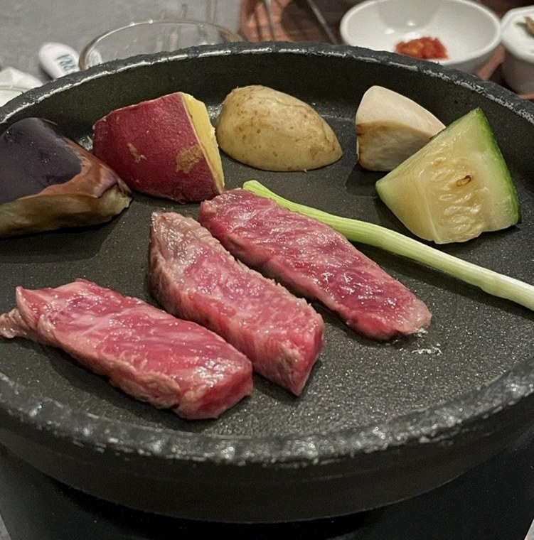WOOHANA Yeouido · Hanwoo beef grilling over binchotan charcoal