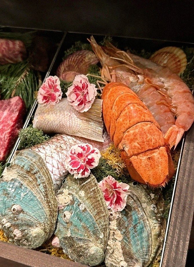 WOOHANA Yeouido · seafood course served alongside the beef